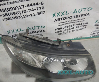 Фото Фара передня права Hyundai Santa FE II 921022B021